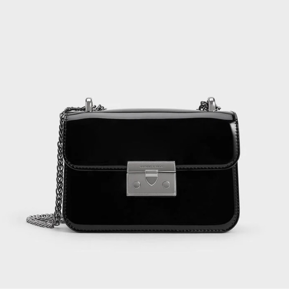 CHARLES AND KEITH ALVA PATENT PUSH LOCK CHAIN BAG IN BLACK